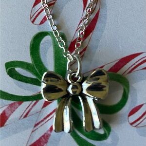 Elegant Silver Bow Pendant Necklace